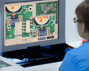 Factory workers in the electronics manufacturing facility