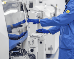Factory workers in the electronics manufacturing facility