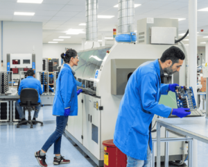 Factory workers in the electronics manufacturing facility