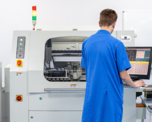 Factory workers in the electronics manufacturing facility